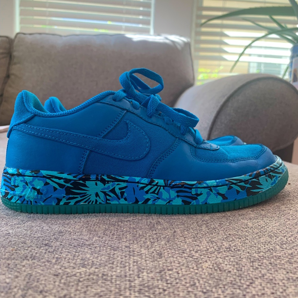 Youth size 5.5 blue Air Force Ones.  Fits women 7